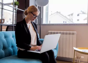 modern young businesswoman using laptop office